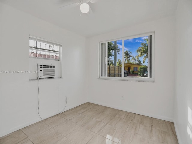 unfurnished room with light tile flooring and ceiling fan