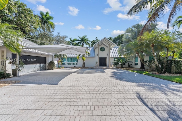 view of front of property with a garage