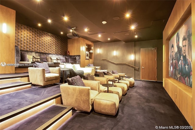 cinema room with dark carpet