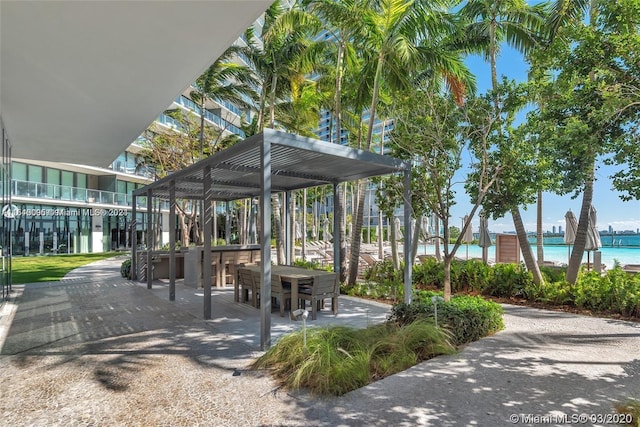 surrounding community featuring a pergola