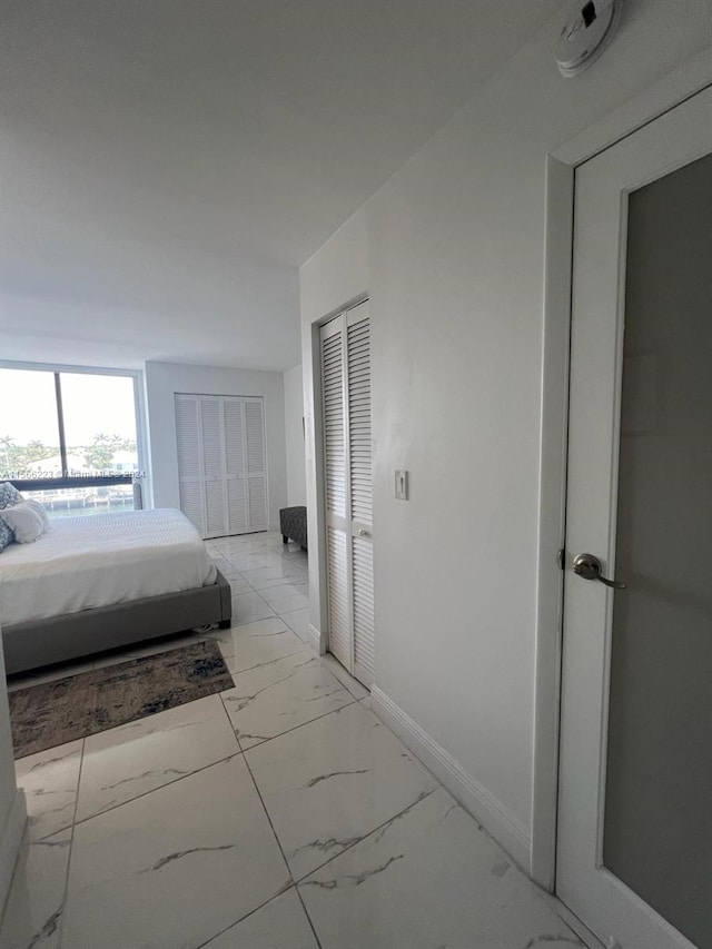 bedroom featuring light tile flooring