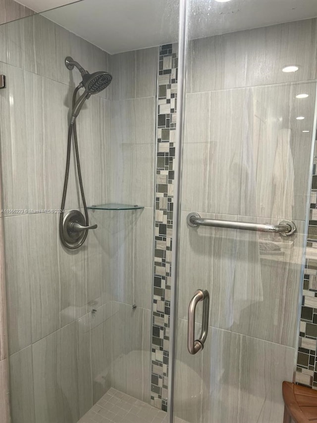 bathroom with an enclosed shower