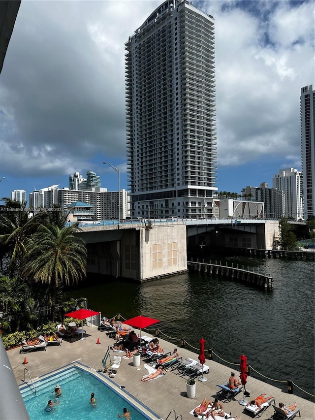 property's view of city featuring a water view