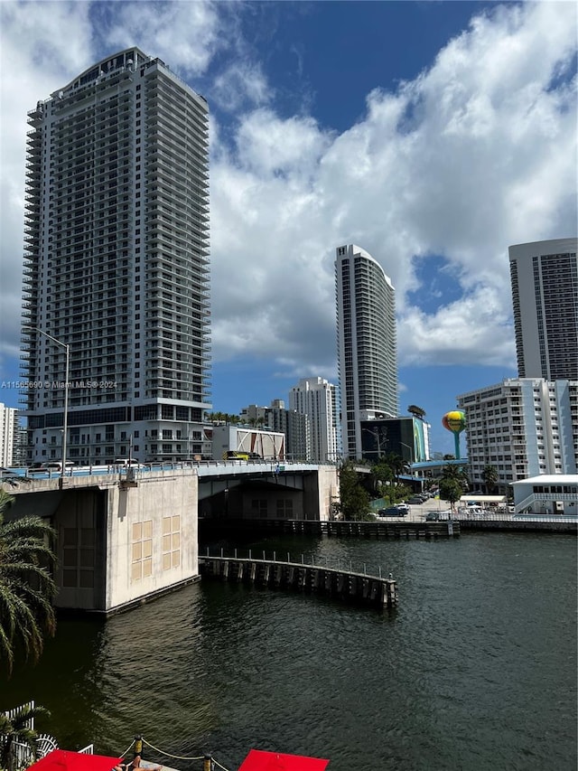 property's view of city featuring a water view