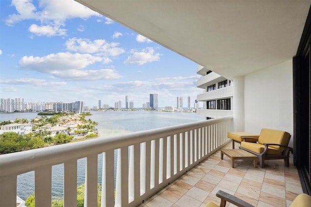 balcony featuring a water view