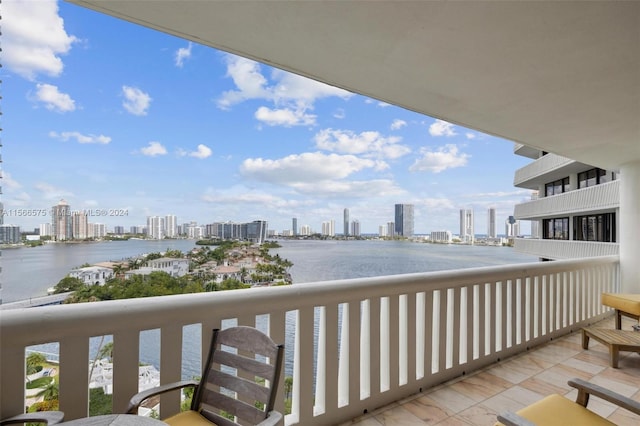 balcony featuring a water view