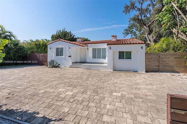 view of front of house featuring a patio