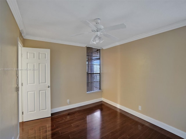 unfurnished room with ceiling fan, dark hardwood / wood-style floors, and crown molding