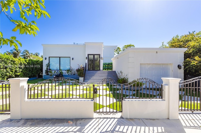 view of front of property featuring a garage