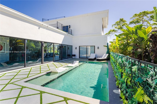 view of pool with a patio