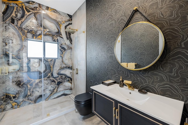 bathroom with oversized vanity, tile floors, and toilet