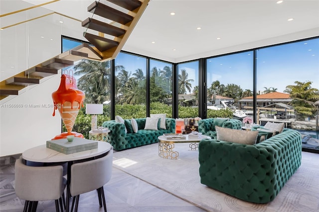 living room with expansive windows and parquet flooring