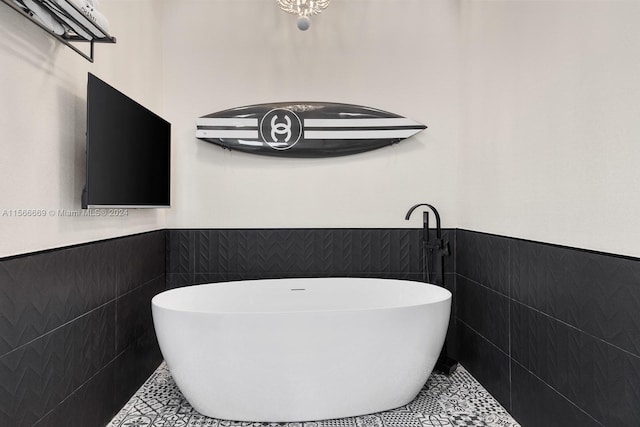 bathroom with tile walls and tile floors