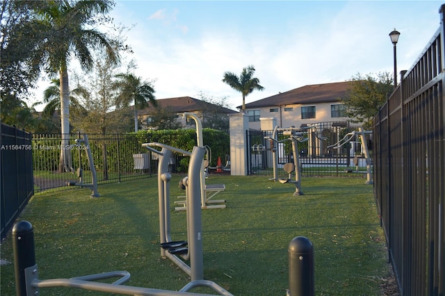 view of property's community featuring a lawn