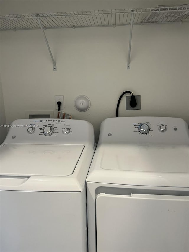 washroom featuring electric dryer hookup and independent washer and dryer