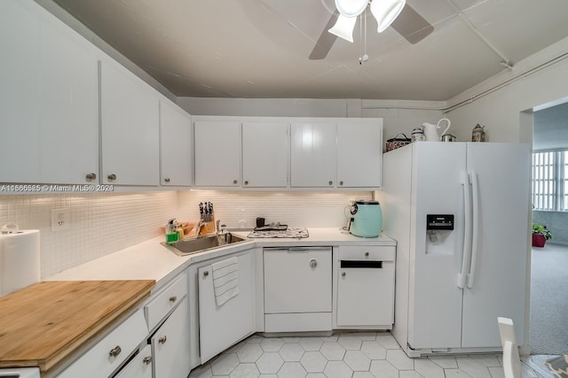 kitchen with tasteful backsplash, white cabinetry, ceiling fan, white appliances, and sink