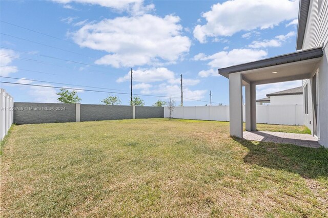 112 Towns, Haines City, FL 33844 - view of yard featuring a fenced backyard