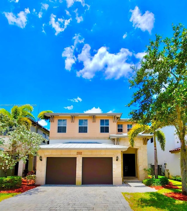 view of front of house with a garage