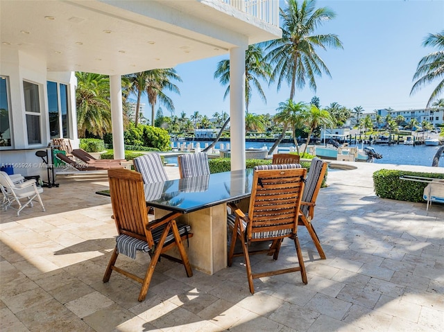 view of patio featuring a water view