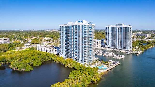 birds eye view of property featuring a water view