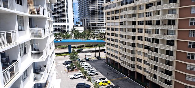 view of pool with a patio and cooling unit