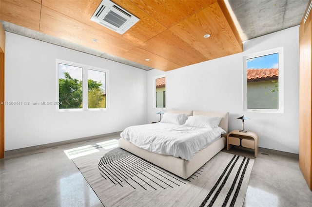 bedroom with concrete floors