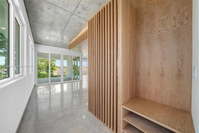 mudroom with concrete flooring