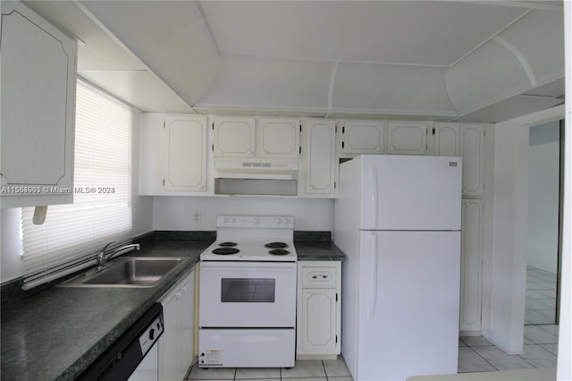 kitchen featuring white appliances, premium range hood, white cabinetry, and light tile floors