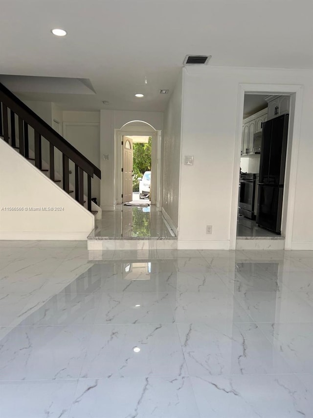 view of tiled foyer entrance