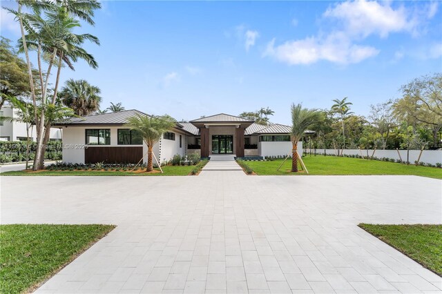 contemporary home featuring a patio