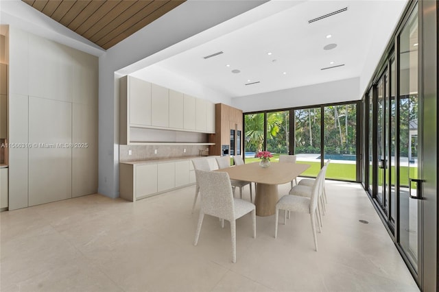 dining space featuring visible vents