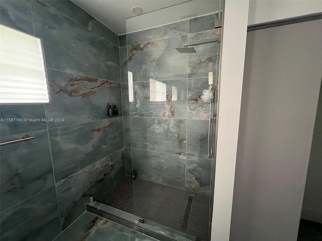 bathroom with an enclosed shower