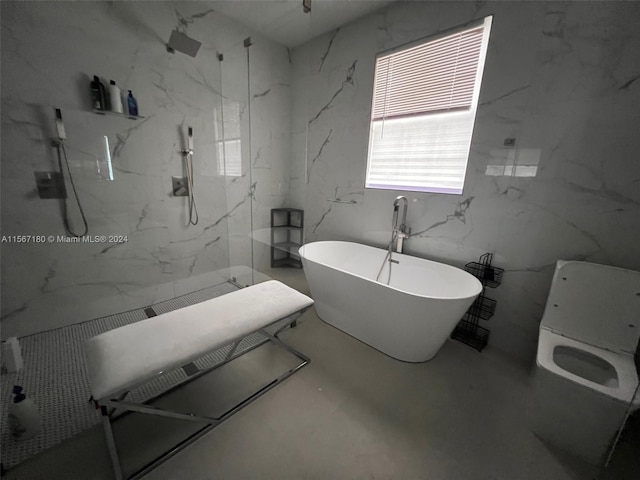 bathroom featuring a bathtub and concrete flooring