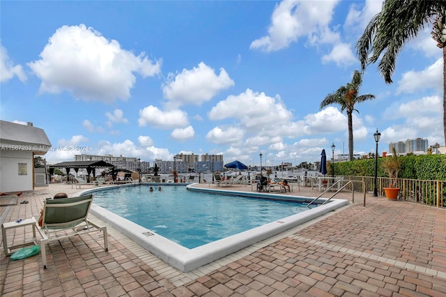 view of swimming pool featuring a patio