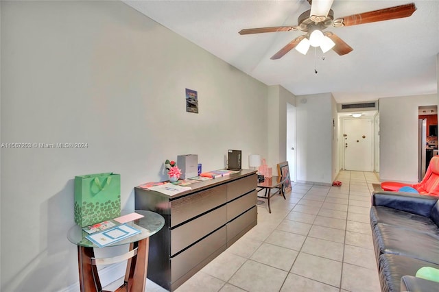 living room with ceiling fan and light tile floors