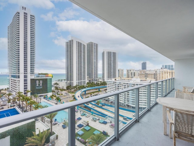 balcony featuring a water view