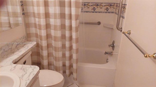 bathroom featuring vanity, toilet, and shower / bath combo with shower curtain