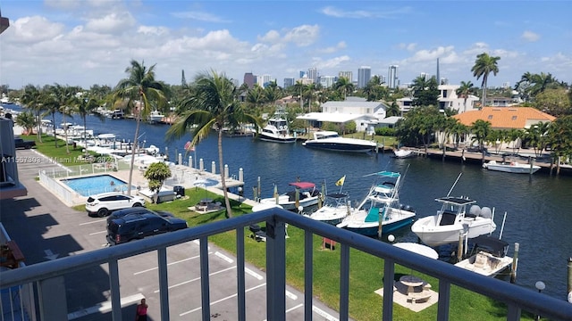 property view of water with a dock