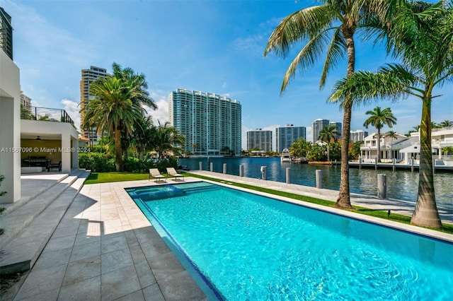 view of swimming pool featuring a patio