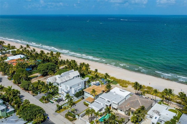 aerial view featuring a water view and a view of the beach