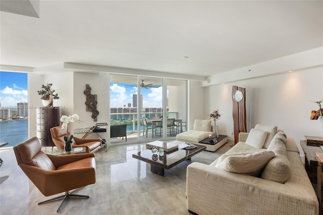 living room with a wealth of natural light and expansive windows