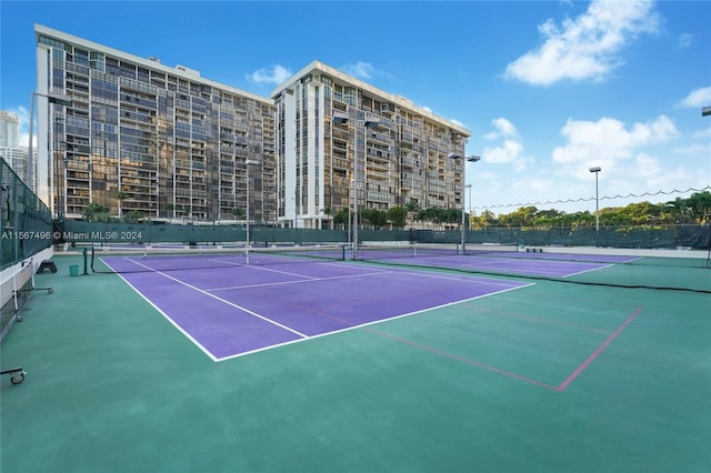 view of tennis court with basketball court