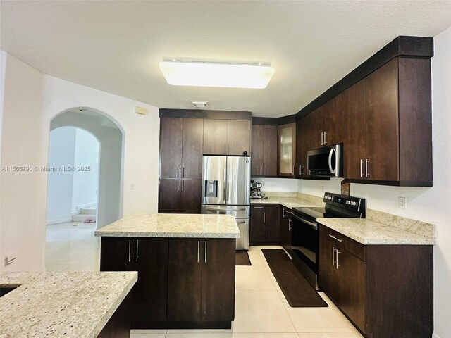 dining room with light tile patterned flooring