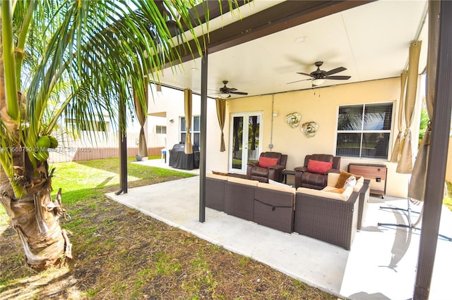 view of patio / terrace with french doors, ceiling fan, grilling area, and an outdoor hangout area