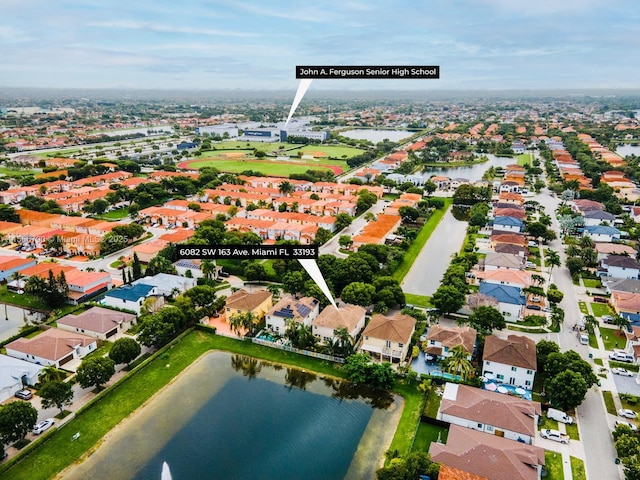 drone / aerial view featuring a water view