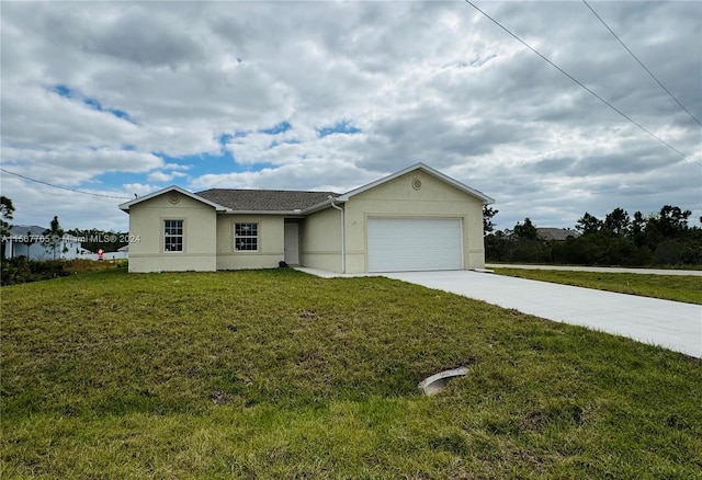 ranch-style home with a front yard and a garage