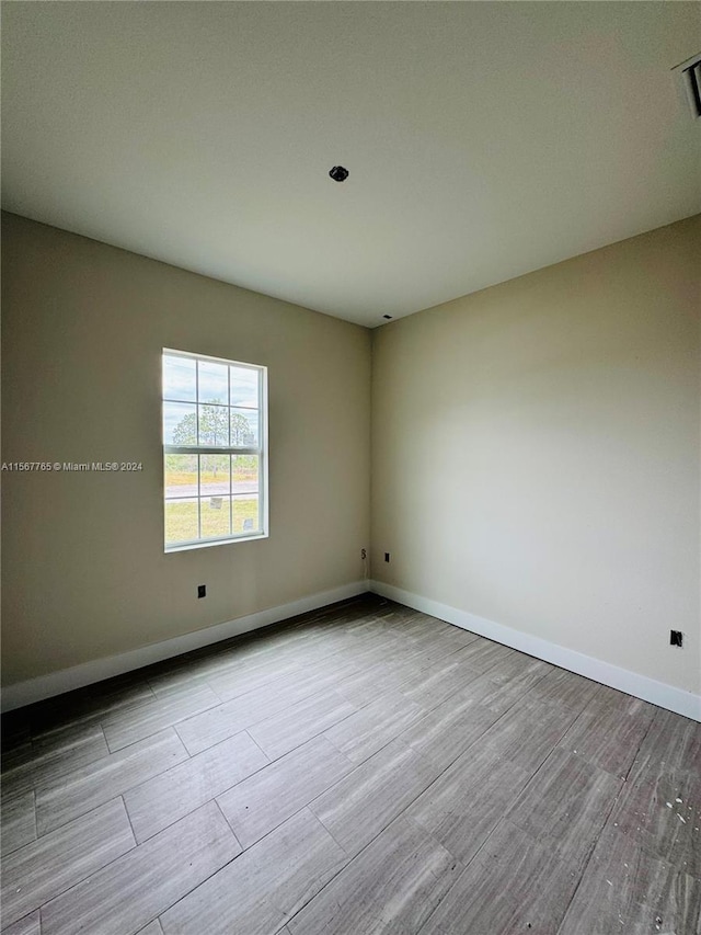 empty room featuring light wood-type flooring