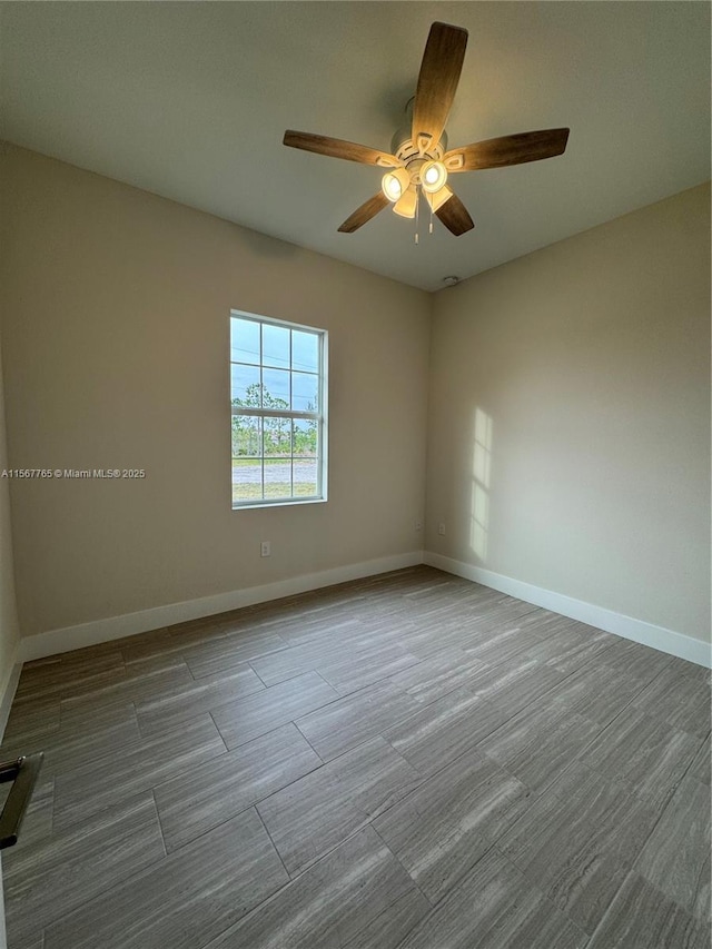 spare room featuring ceiling fan