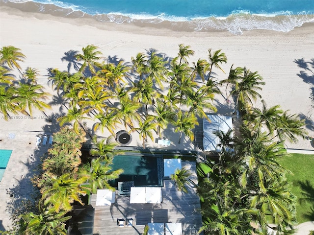 drone / aerial view featuring a beach view