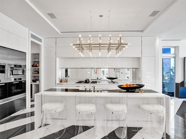 interior space featuring white cabinetry and tile floors